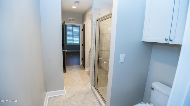 8700 Front Beach Rd Unit 5302, Panama City Beach, FL 32407 - bathroom with visible vents, tile patterned floors, baseboards, and a shower stall