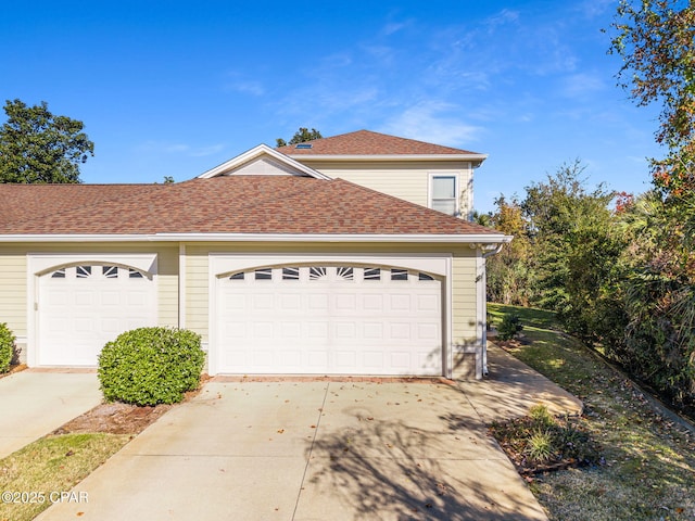 view of property exterior featuring a garage