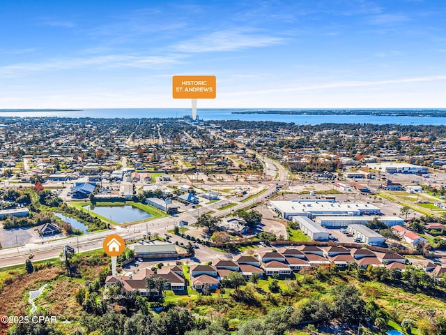 birds eye view of property featuring a water view