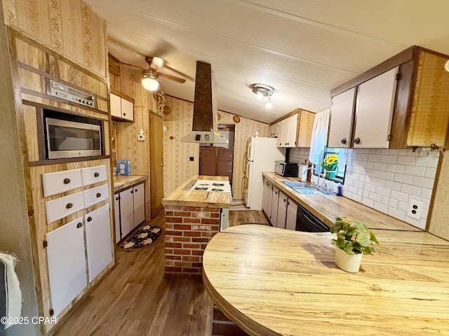 kitchen featuring light wood-type flooring, white appliances, extractor fan, sink, and white cabinets