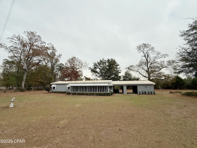 view of front of home with a front yard