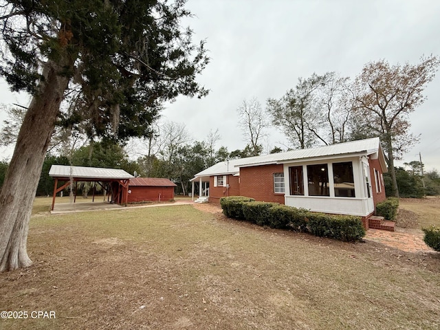 view of yard with a carport