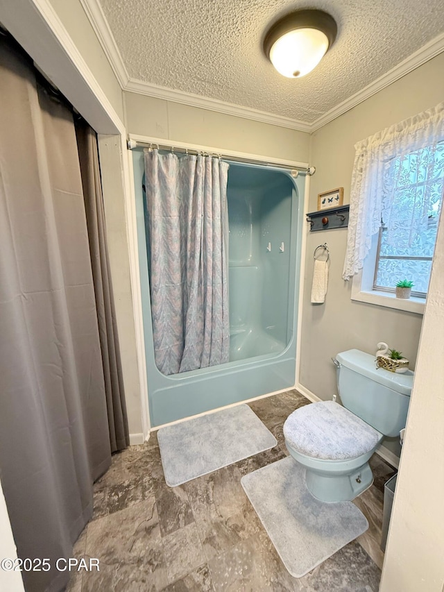 bathroom with a textured ceiling, toilet, and crown molding