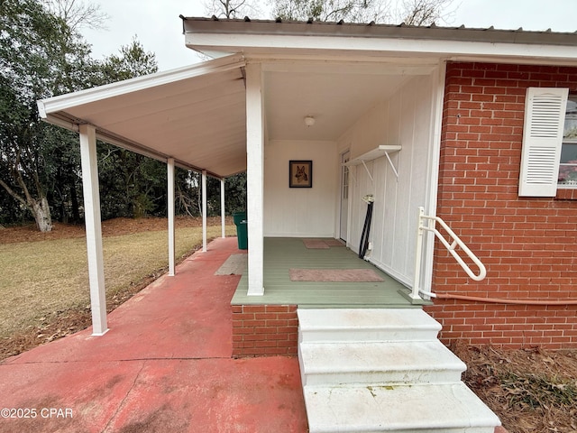 exterior space featuring a lawn and covered porch