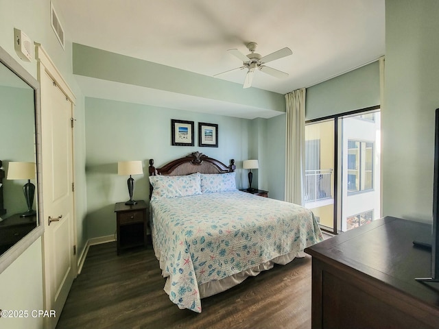 bedroom with ceiling fan and dark hardwood / wood-style flooring