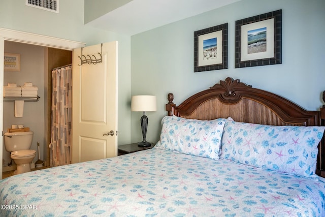 bedroom featuring ensuite bathroom