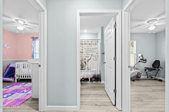 3111 E 2nd Plz, Panama City, FL 32401 - hall featuring light wood-style floors and baseboards