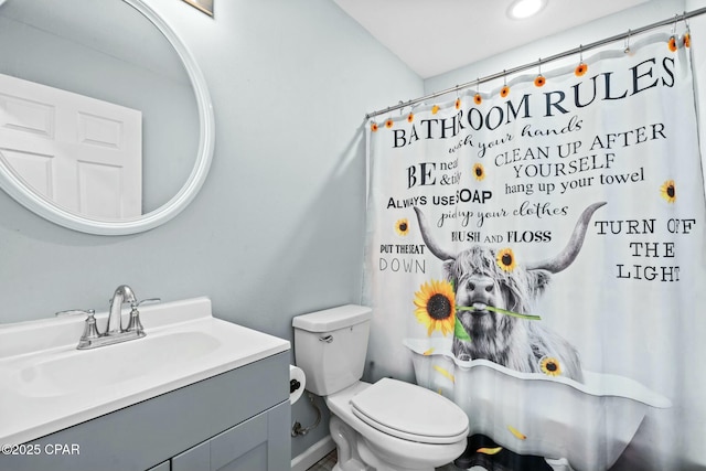 3111 E 2nd Plz, Panama City, FL 32401 - bathroom featuring vanity, toilet, and a shower with shower curtain