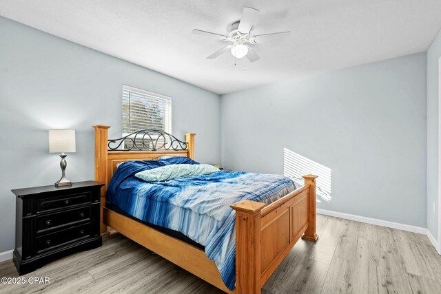 3111 E 2nd Plz, Panama City, FL 32401 - bedroom with light wood-style floors, baseboards, and ceiling fan