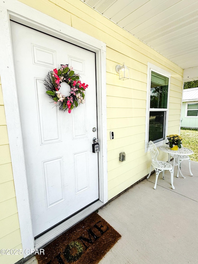 3111 E 2nd Plz, Panama City, FL 32401 - doorway to property with covered porch