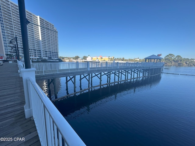 view of dock with a water view