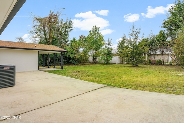 view of yard with a patio and central AC