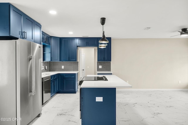 kitchen with blue cabinetry, ceiling fan, stainless steel appliances, backsplash, and pendant lighting