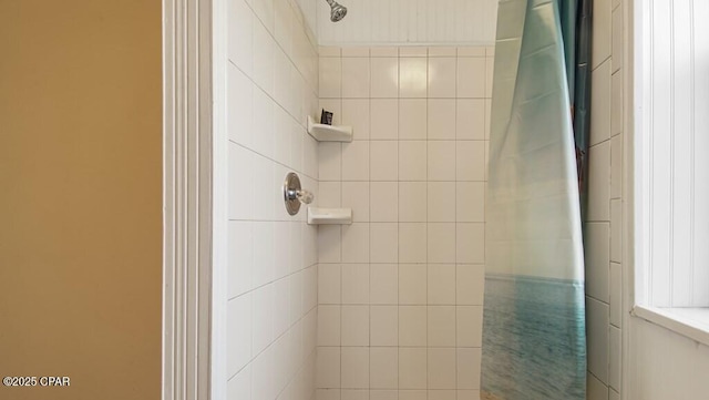 bathroom with a shower with shower curtain