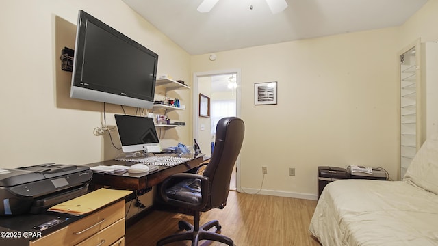 bedroom with ceiling fan and light wood-type flooring