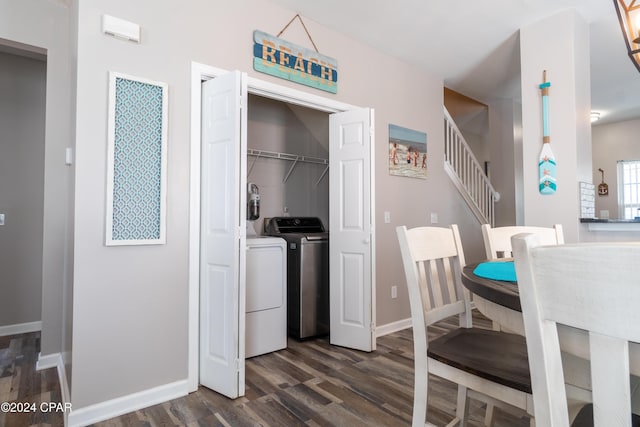 dining room featuring washer and dryer and dark wood-type flooring