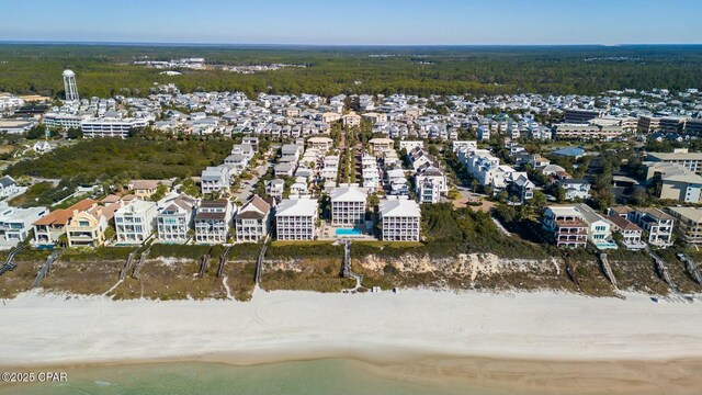 drone / aerial view with a view of the beach and a water view