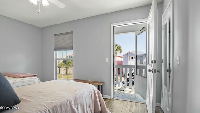 bedroom featuring hardwood / wood-style flooring and ceiling fan