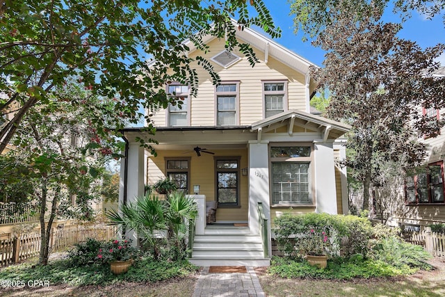 view of front of property with ceiling fan and a porch