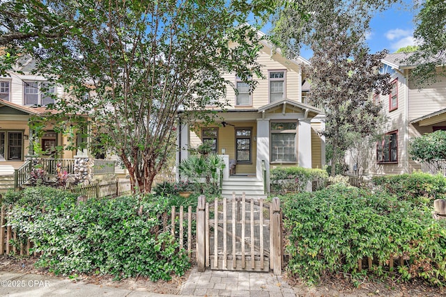 obstructed view of property with a porch