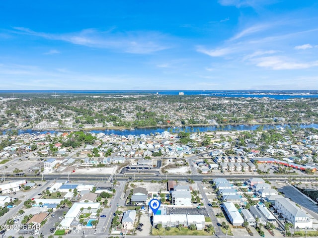 birds eye view of property featuring a water view and a residential view