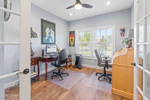 office area featuring ceiling fan, french doors, and hardwood / wood-style flooring