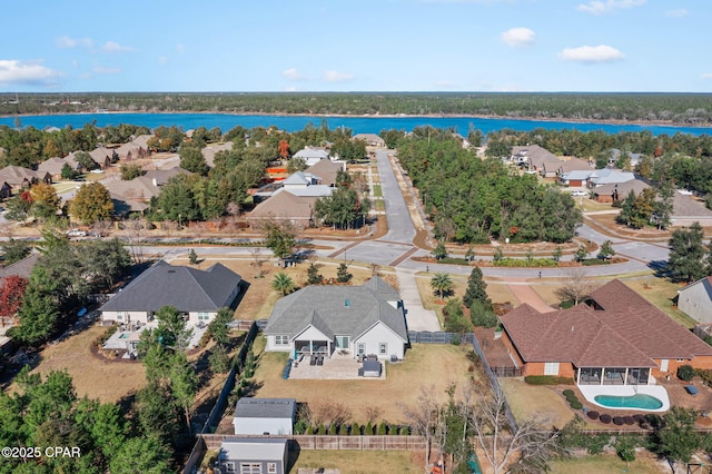 drone / aerial view with a water view