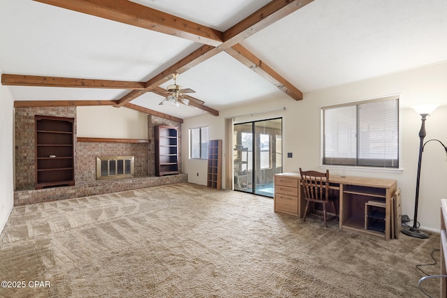 unfurnished living room featuring vaulted ceiling with beams, ceiling fan, carpet, and a brick fireplace