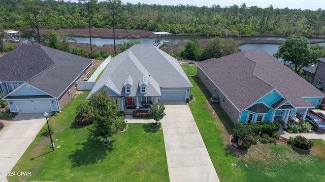 bird's eye view with a water view