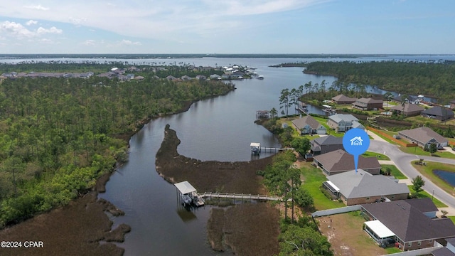 bird's eye view with a water view