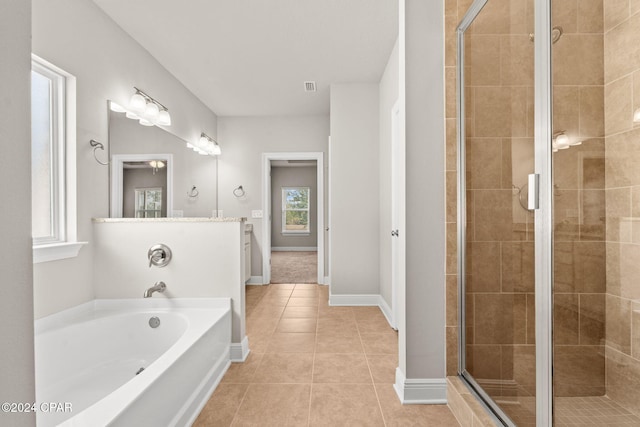 bathroom featuring ceiling fan, separate shower and tub, tile patterned flooring, and vanity