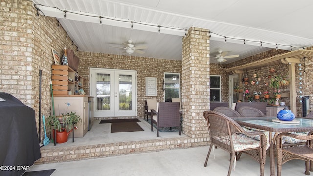 view of patio / terrace featuring ceiling fan, french doors, and a grill