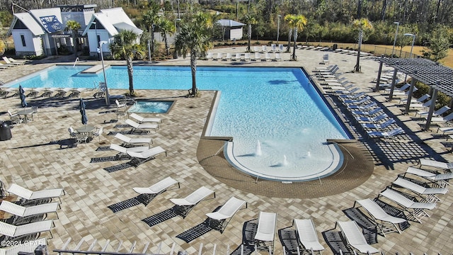 view of swimming pool with a patio area