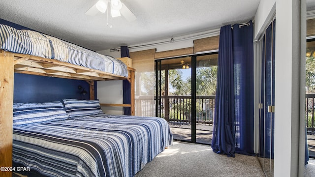 carpeted bedroom with access to exterior, ceiling fan, and a textured ceiling