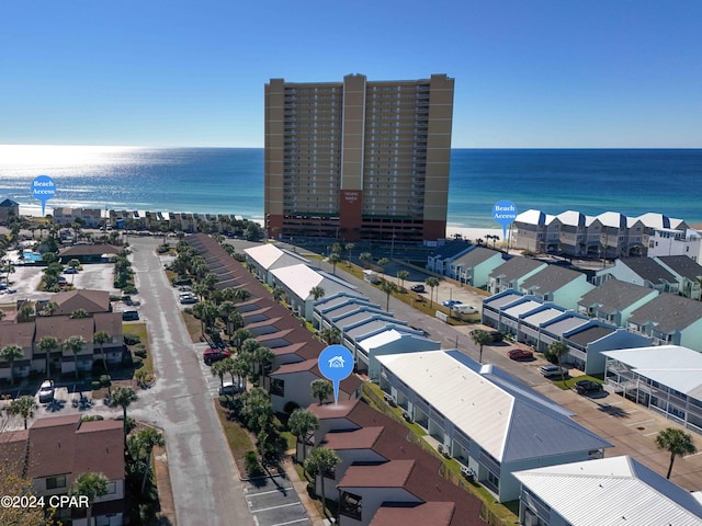 birds eye view of property featuring a water view and a residential view