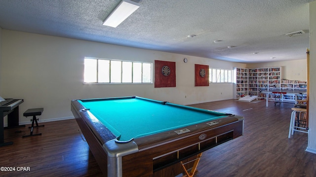 rec room featuring a textured ceiling, billiards, wood finished floors, visible vents, and baseboards