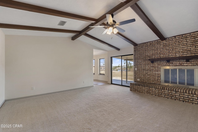 unfurnished living room featuring light carpet, a fireplace, ceiling fan, and lofted ceiling with beams