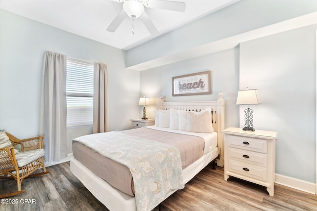 bedroom featuring ceiling fan and hardwood / wood-style floors