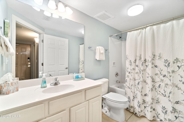 full bathroom featuring tile patterned flooring, shower / bath combination with curtain, vanity, and toilet