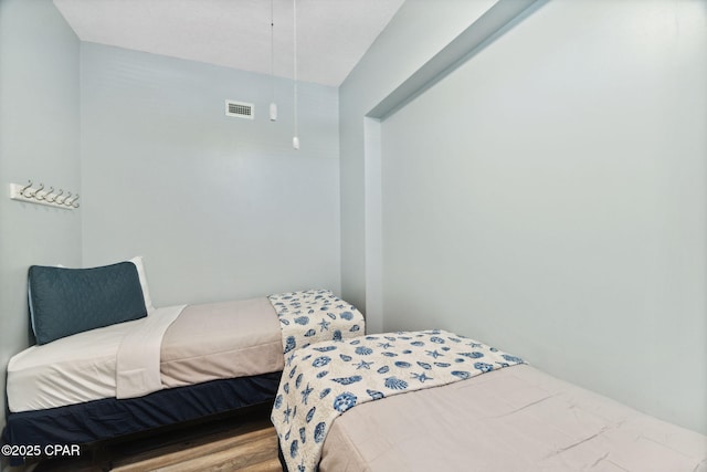 bedroom with light wood-type flooring