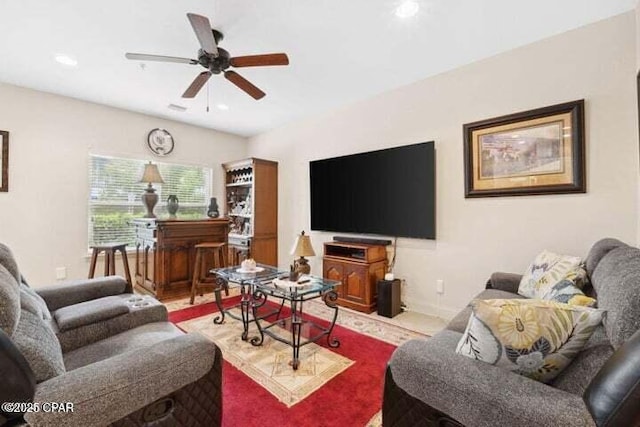 living room featuring recessed lighting and ceiling fan