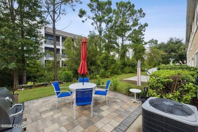 view of patio / terrace with central air condition unit, a grill, and outdoor dining area