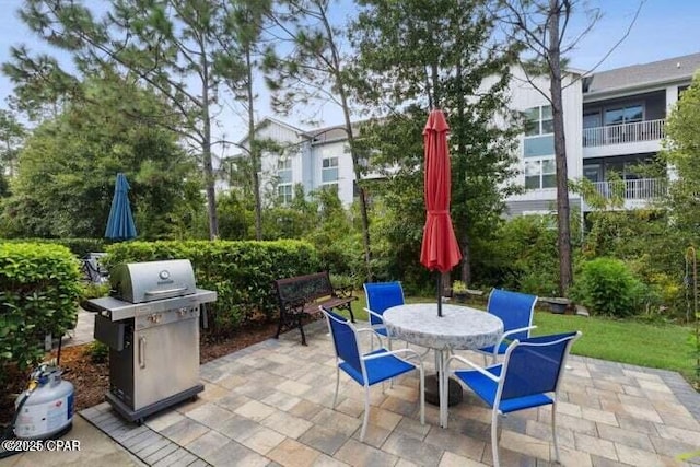 view of patio / terrace featuring grilling area and outdoor dining area