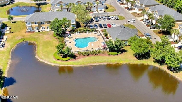 aerial view featuring a residential view and a water view