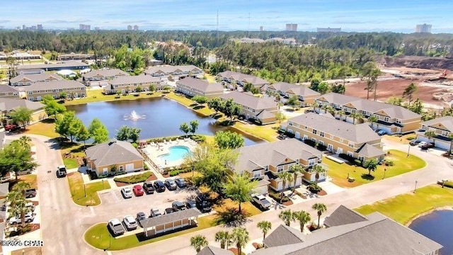 aerial view with a residential view and a water view