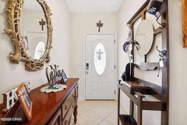 entryway with light tile patterned floors