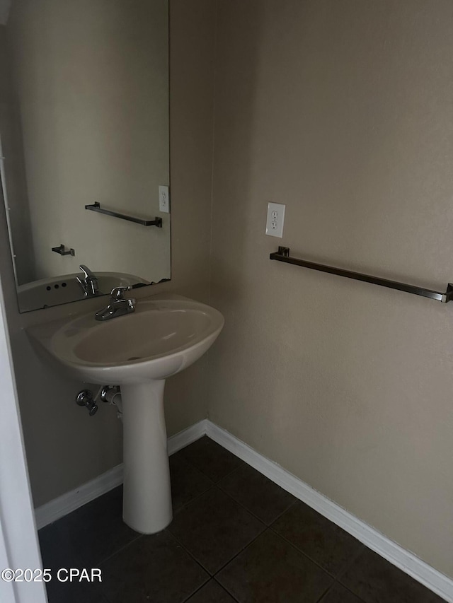 bathroom featuring tile patterned flooring