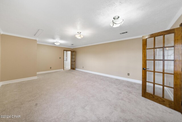 carpeted office space featuring crown molding