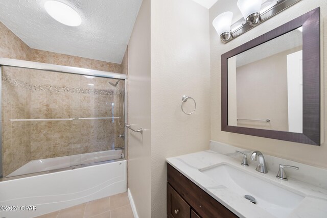 unfurnished room featuring crown molding, french doors, light carpet, and a textured ceiling