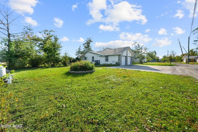 view of yard with a garage